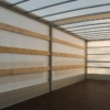 Aanhangwagen verhuur schamelwagen met huif 3